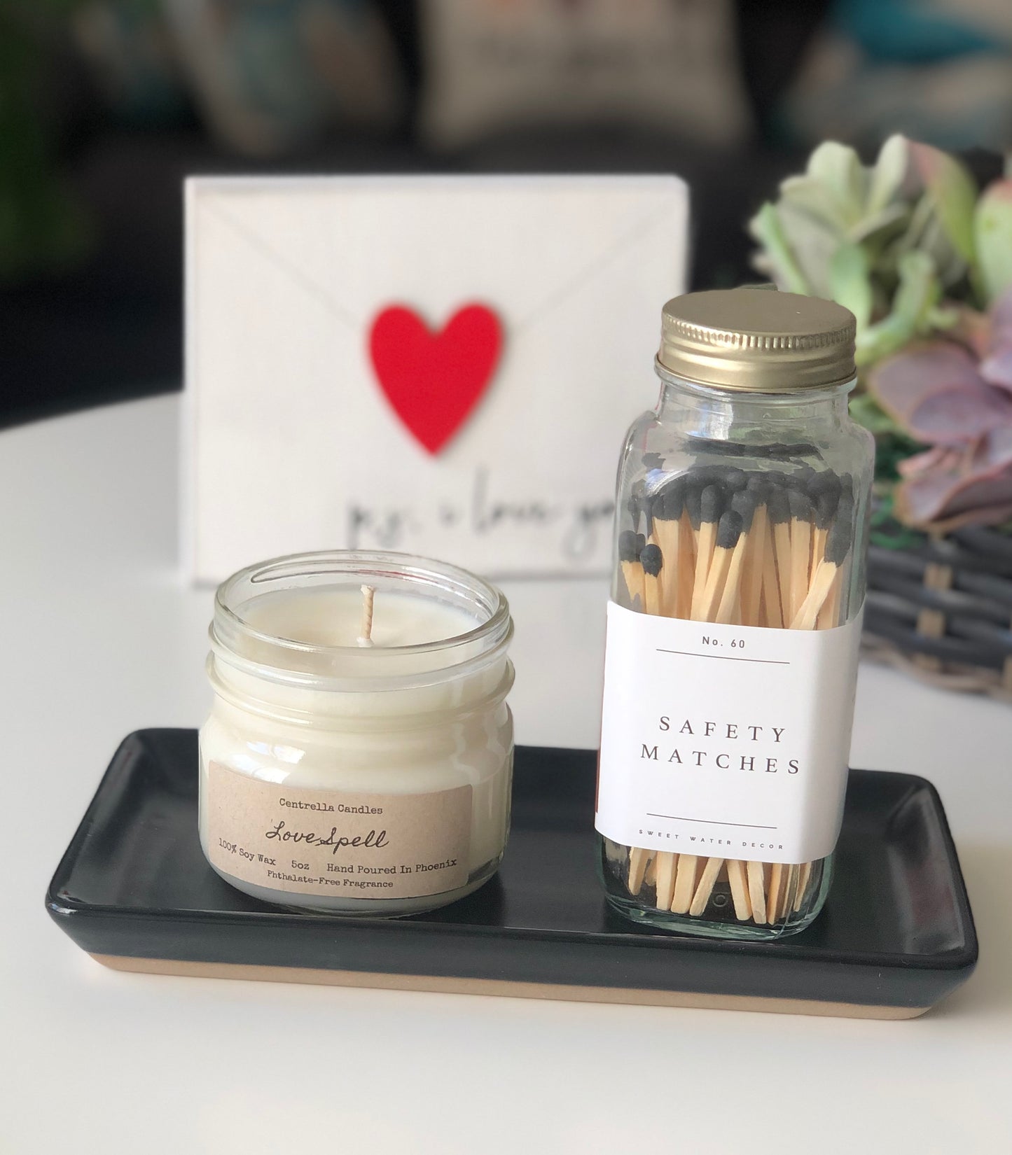 5oz candle, candle tray, and luxury matches.