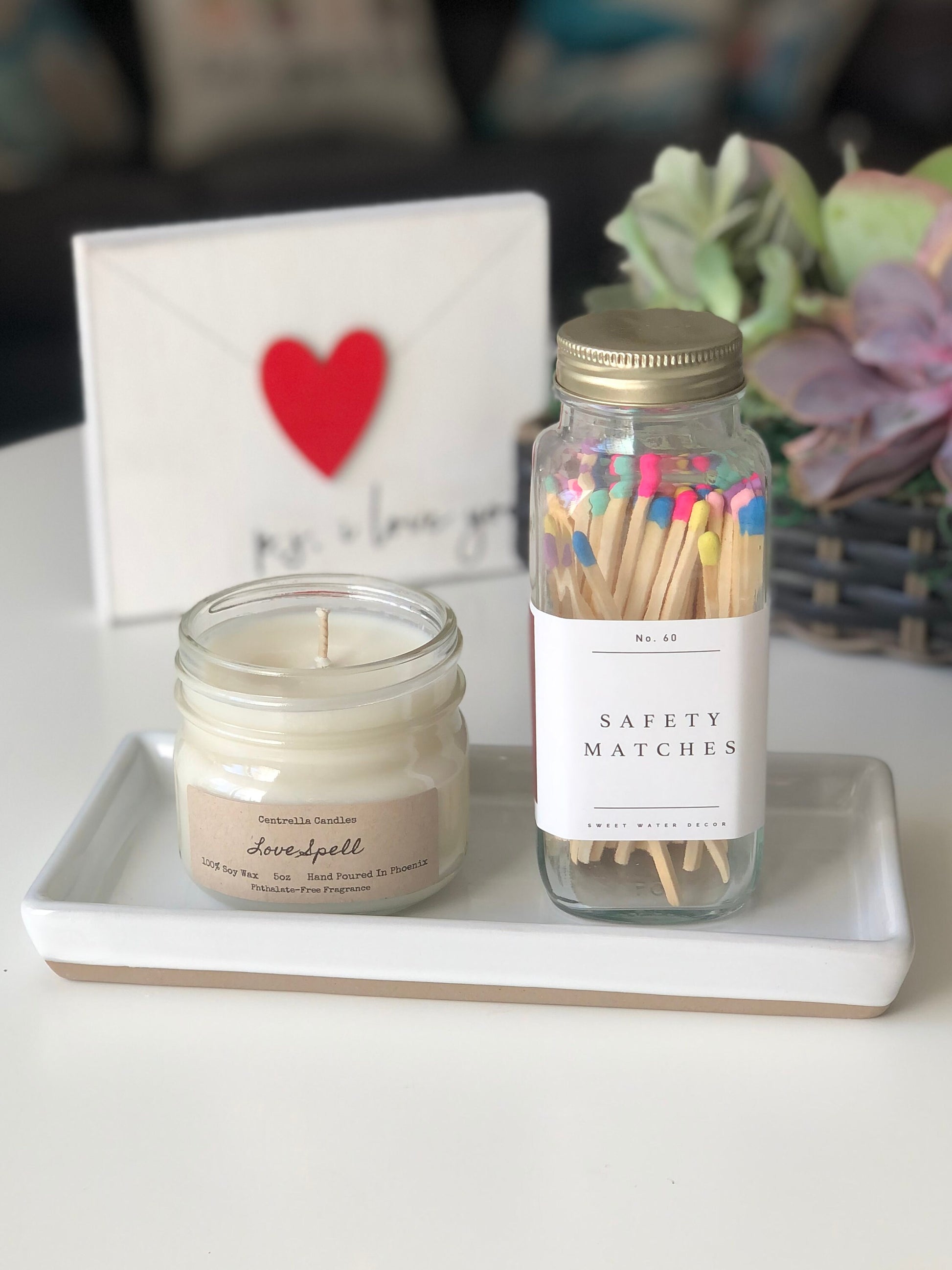 5oz candle, candle tray, and luxury matches.